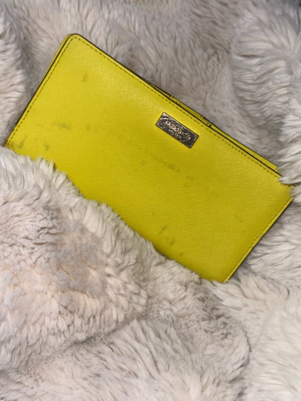 kate spade Yellow Saffiano Zip Wallet with Metal Logo Plate